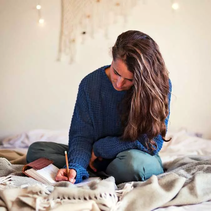 down the rabbit hole - journaling A person in deep thought reflecting on communication and connection.