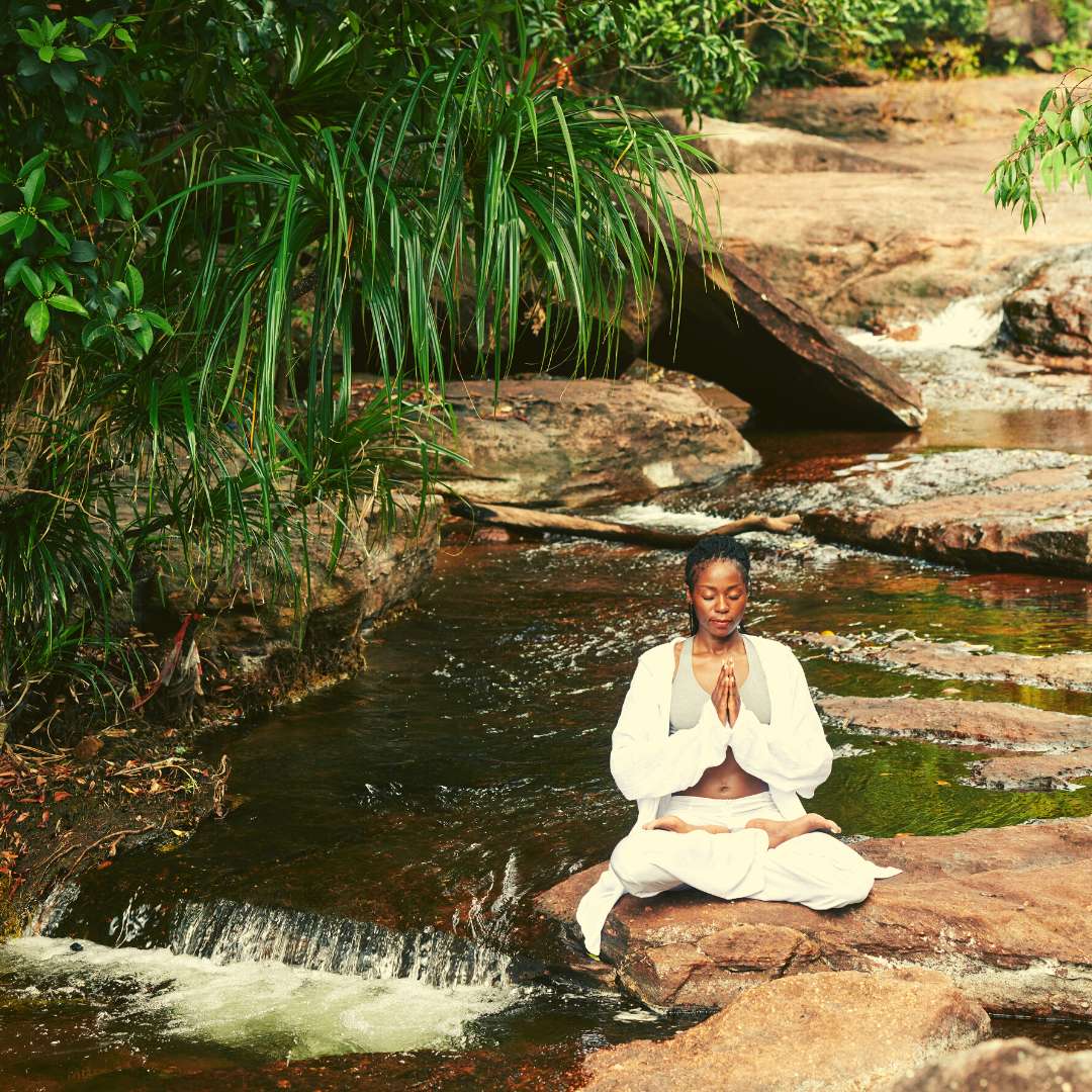 Individual practicing deep breathing meditation for stress relief